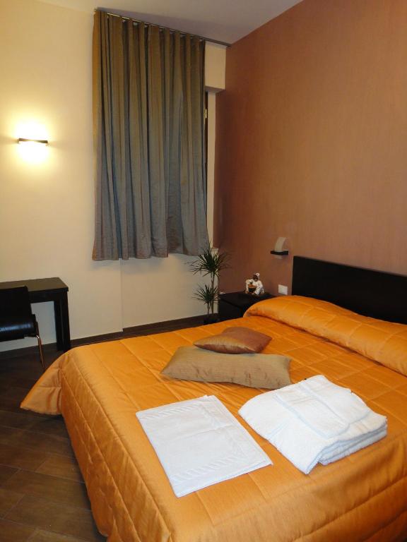 Posteľ alebo postele v izbe v ubytovaní B&B Il Campanile