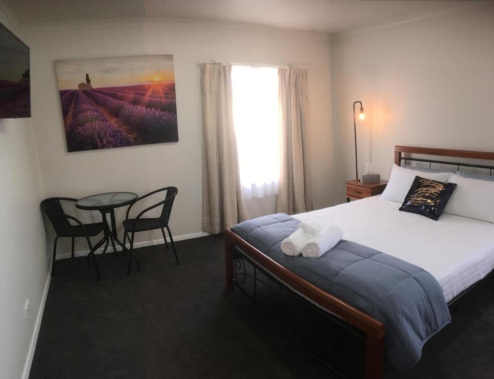 Ένα ή περισσότερα κρεβάτια σε δωμάτιο στο 3ree- Spacious & Charming Apartment