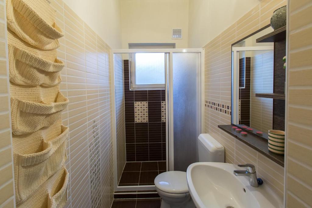 Kúpeľňa v ubytovaní Holiday House Siófok