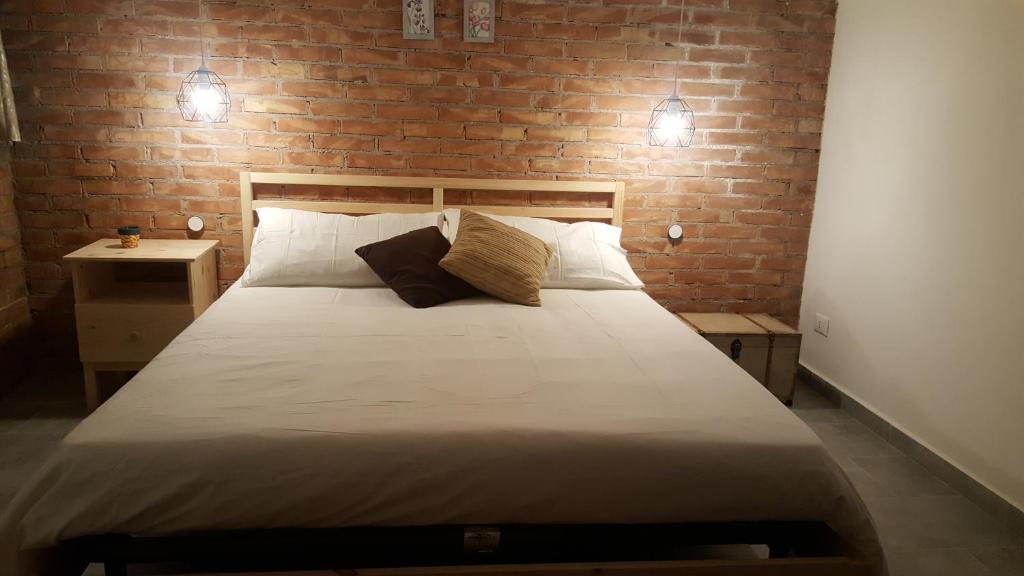 Postel nebo postele na pokoji v ubytování Chalet Gea