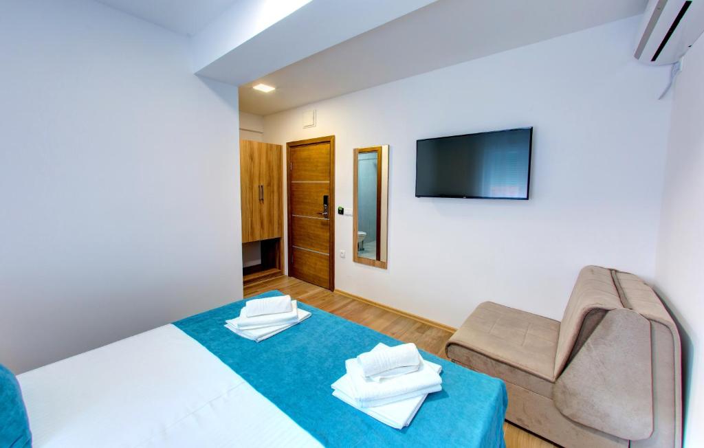 Postel nebo postele na pokoji v ubytování Villa Floris