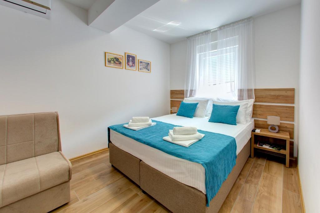 Postel nebo postele na pokoji v ubytování Villa Floris