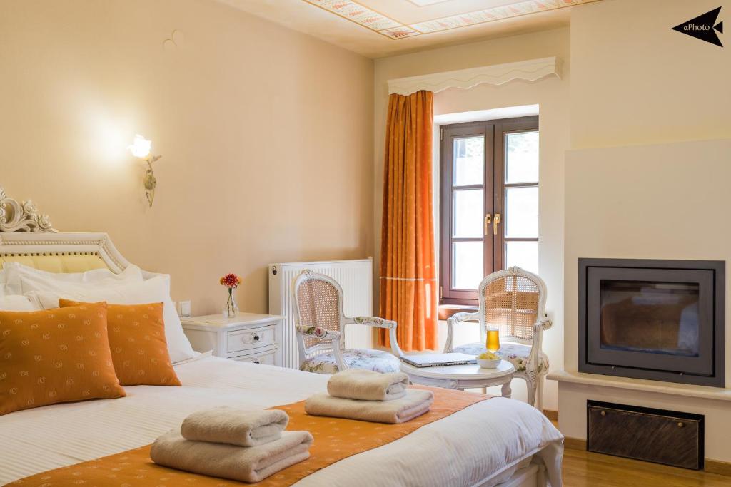 Postel nebo postele na pokoji v ubytování Villa Paroraia