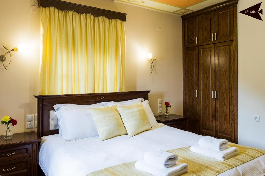Postel nebo postele na pokoji v ubytování Villa Paroraia