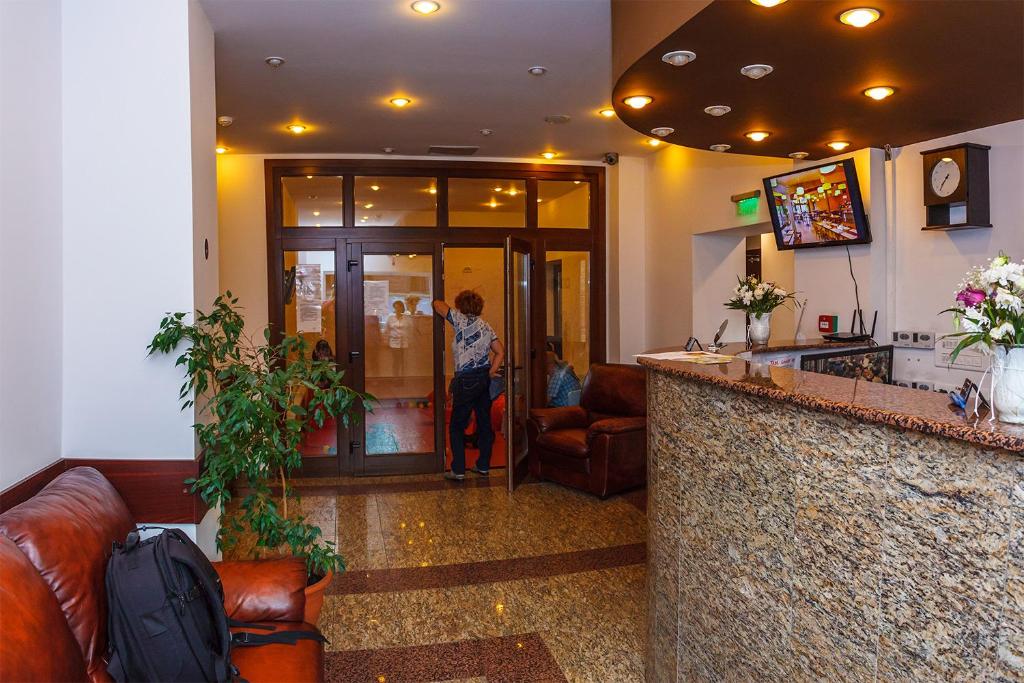 TV a/nebo společenská místnost v ubytování Hotel Piatra Soimului