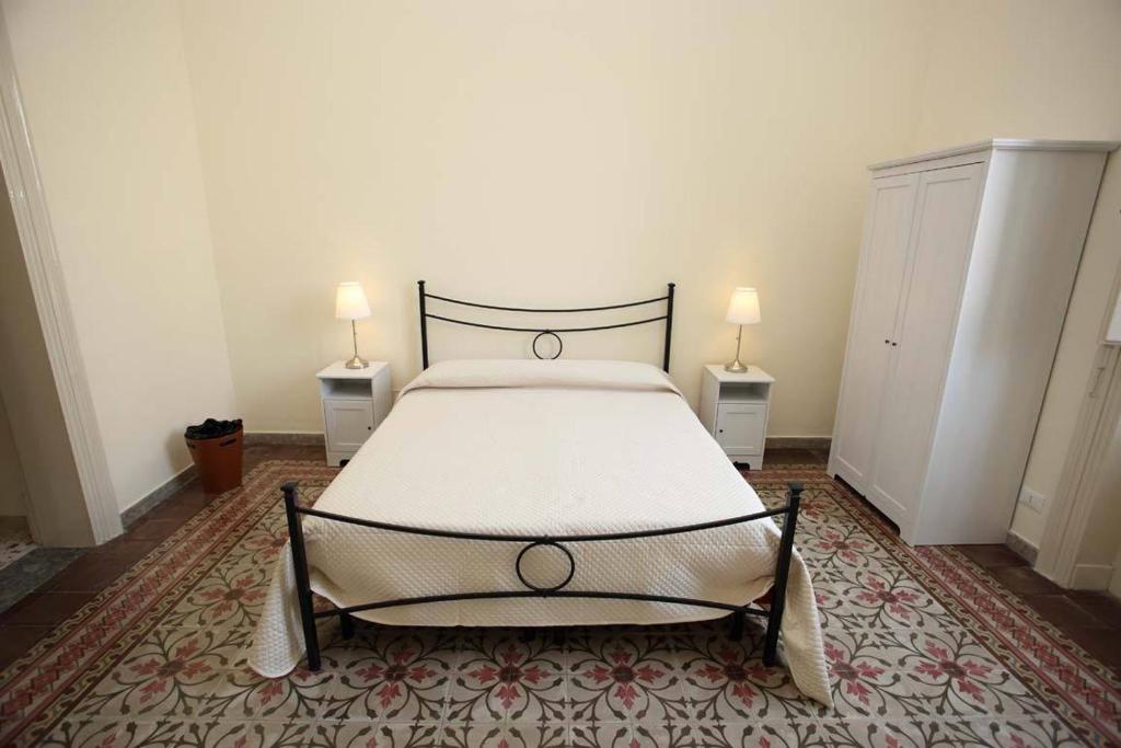 A bed or beds in a room at Alla Busiata