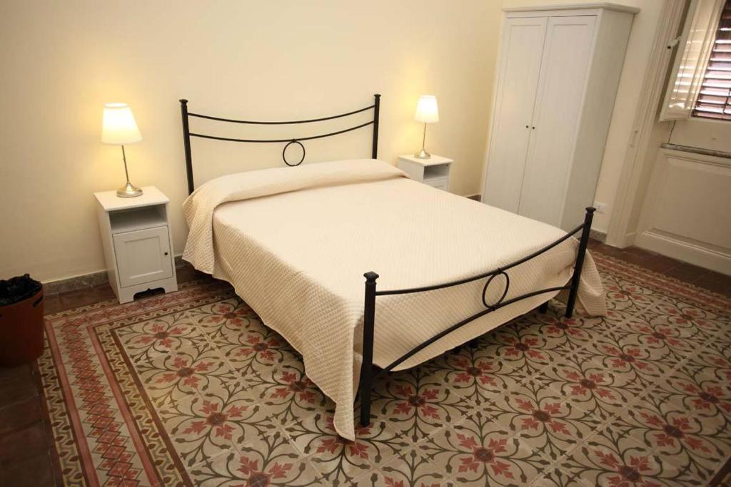 A bed or beds in a room at Alla Busiata