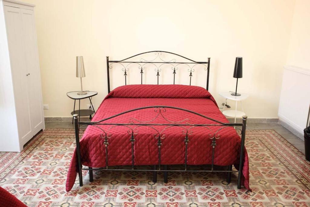 A bed or beds in a room at Alla Busiata