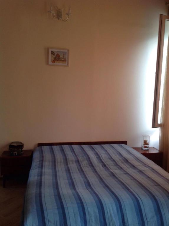 Postel nebo postele na pokoji v ubytování L House