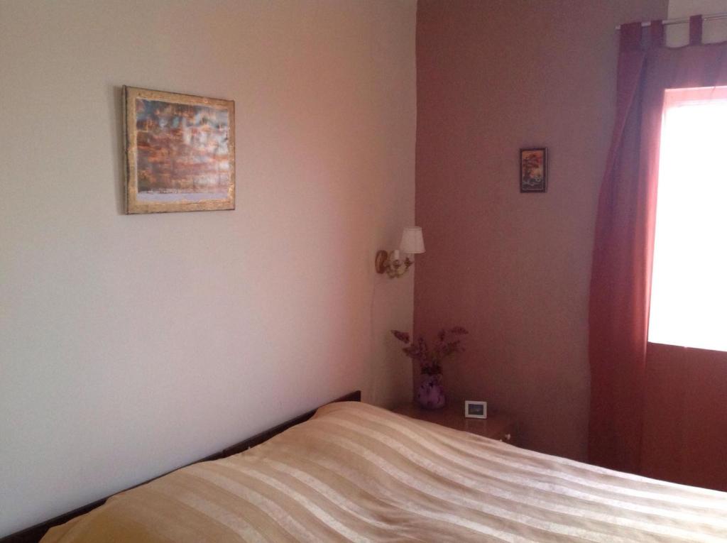 Postel nebo postele na pokoji v ubytování L House