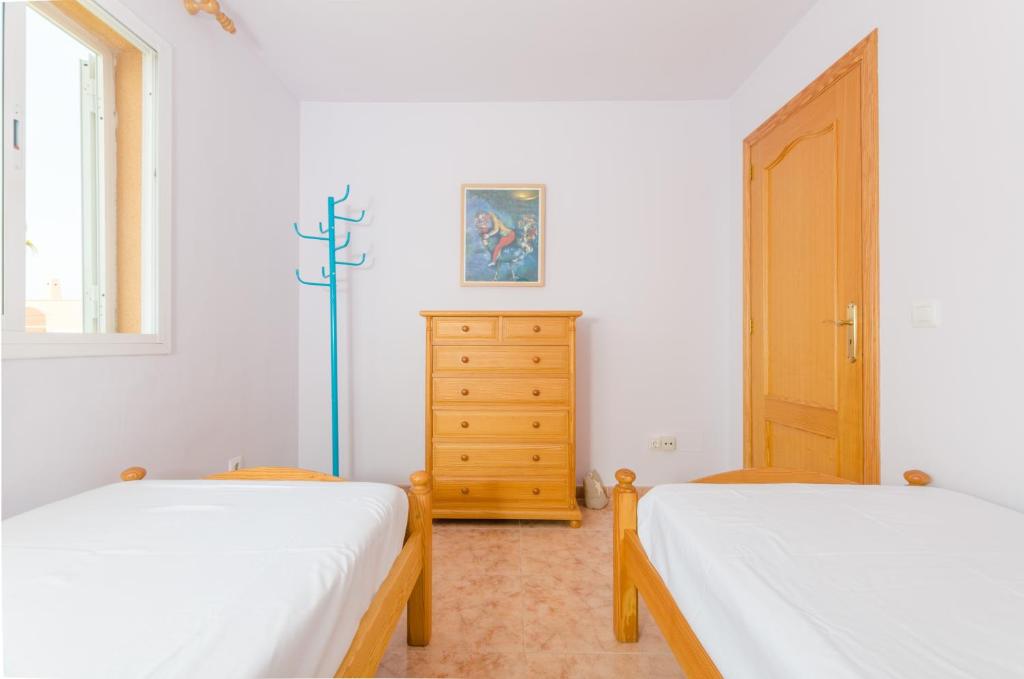 Postel nebo postele na pokoji v ubytování Aritja, 5