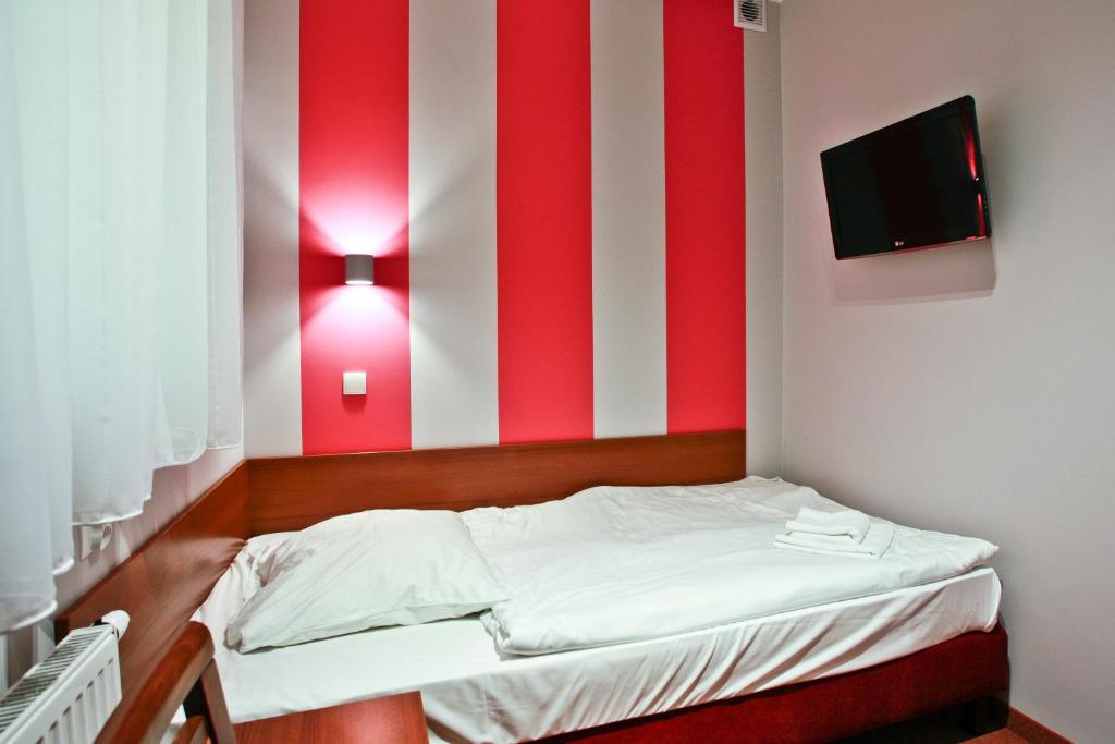 Posteľ alebo postele v izbe v ubytovaní Hotel Chabrowy Dworek
