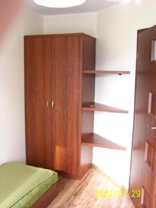 Posteľ alebo postele v izbe v ubytovaní Apartamenty Jasna