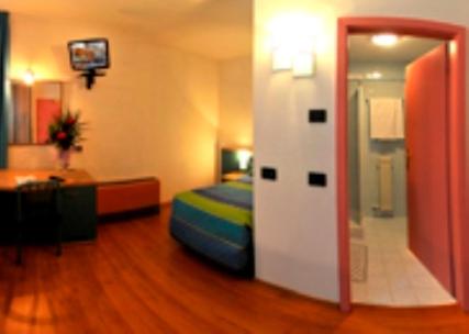 Postel nebo postele na pokoji v ubytování Hotel Vela