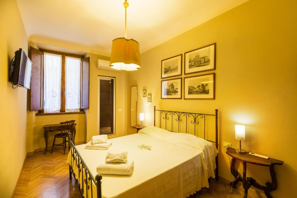 Postel nebo postele na pokoji v ubytování Piccolo Sogno flat
