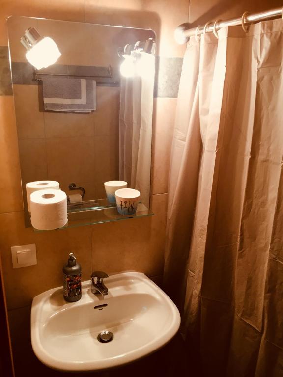 Koupelna v ubytování AVRA Rooms