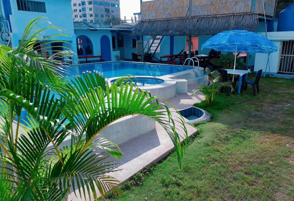 Bazén v ubytování Hostal Aruba nebo v jeho okolí