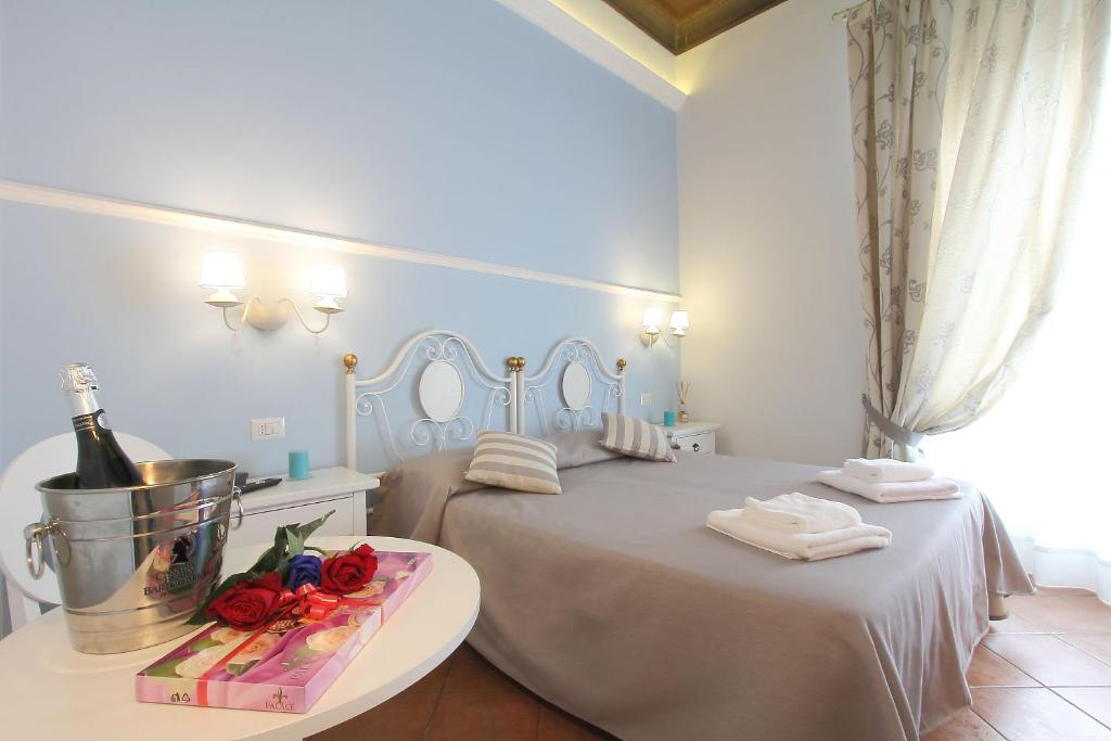 Nápoje v ubytování Hotel Ferrucci