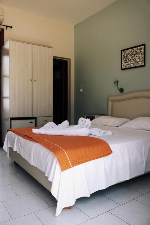 Posteľ alebo postele v izbe v ubytovaní Esperida rooms & studios