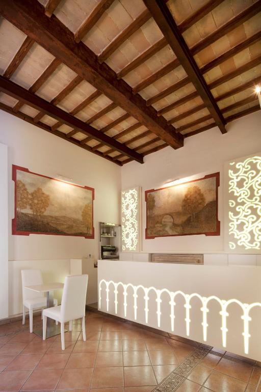 Posedenie v ubytovaní Hotel Degli Affreschi