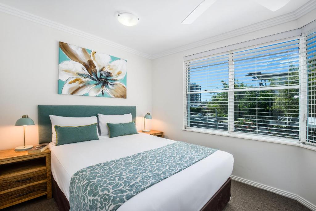 Postel nebo postele na pokoji v ubytování Watermark Resort Caloundra