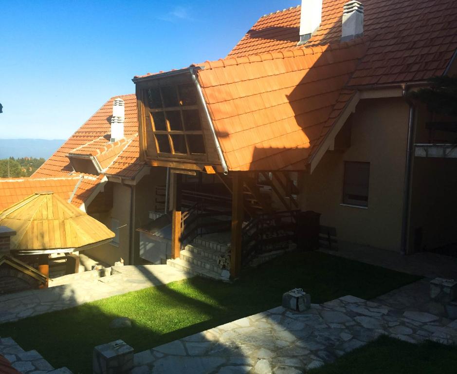 an overhead view of a house with a roof at Apartment Jovana in Kopaonik