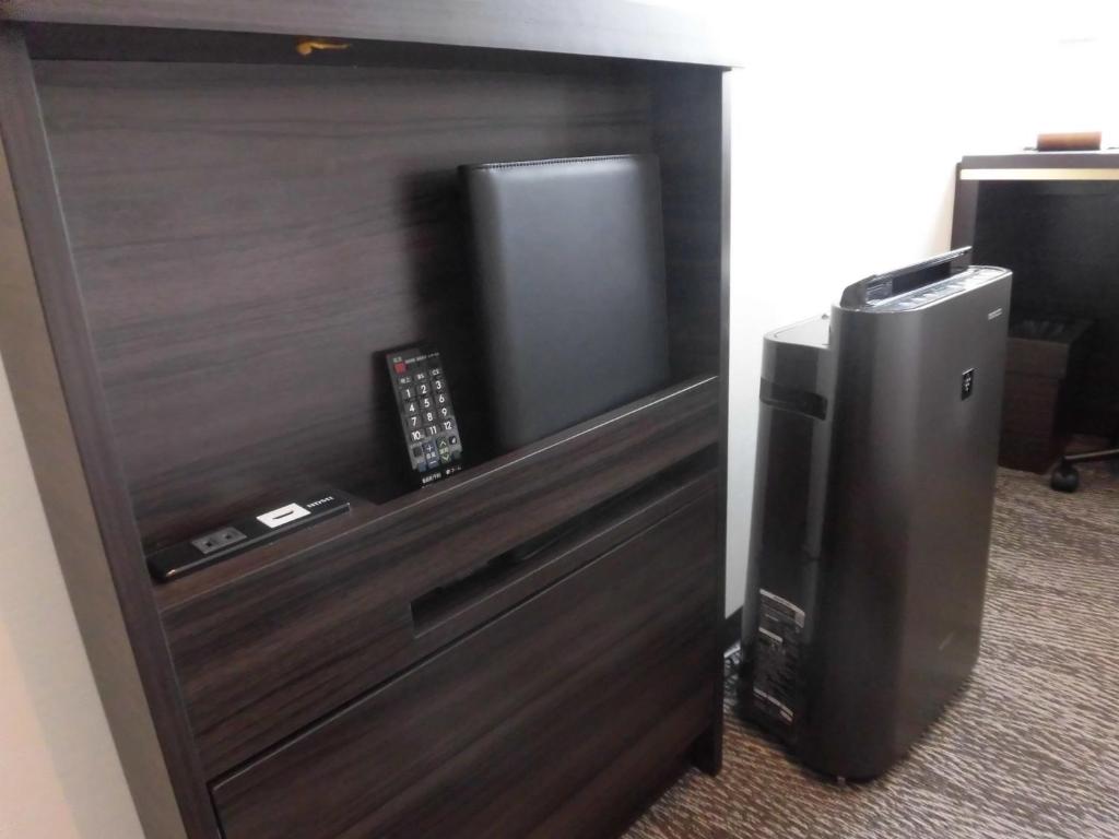 TV a/nebo společenská místnost v ubytování Via Inn Nagoya Station Tsubaki-cho