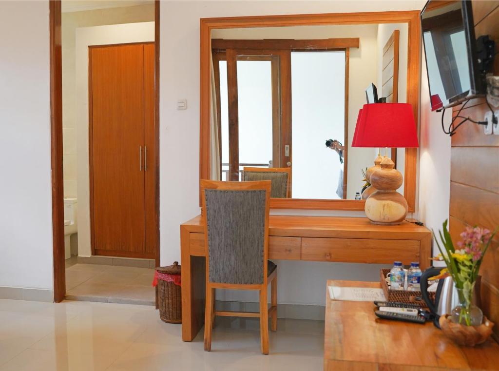 TV a/nebo společenská místnost v ubytování Lebak Bali Residence