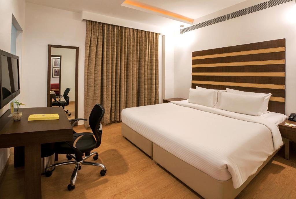 TV a/nebo společenská místnost v ubytování Lemon Tree Hotel Alwar