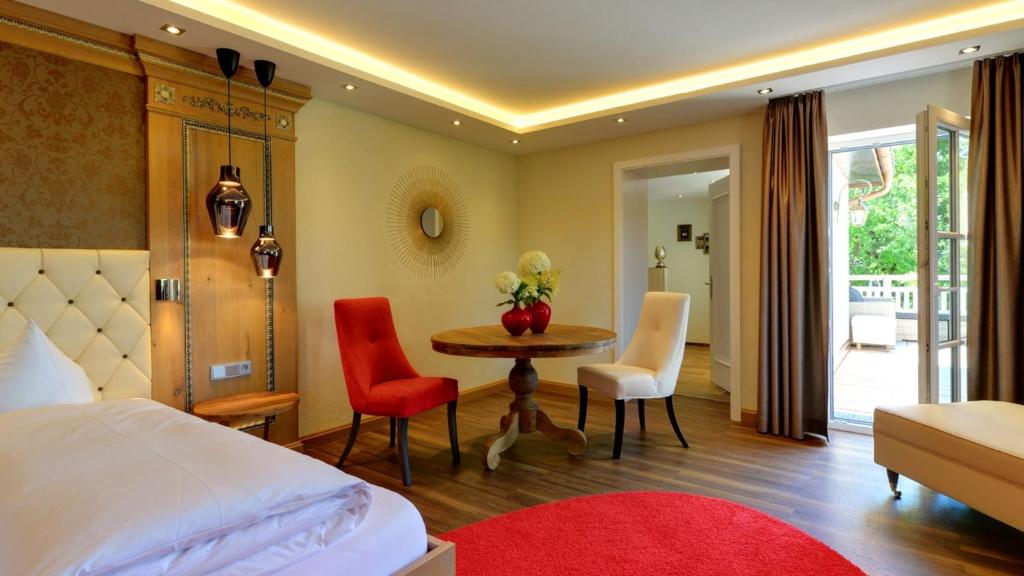 Postel nebo postele na pokoji v ubytování Boutique Hotel POST ANDECHS