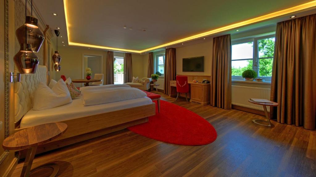 Postel nebo postele na pokoji v ubytování Boutique Hotel POST ANDECHS