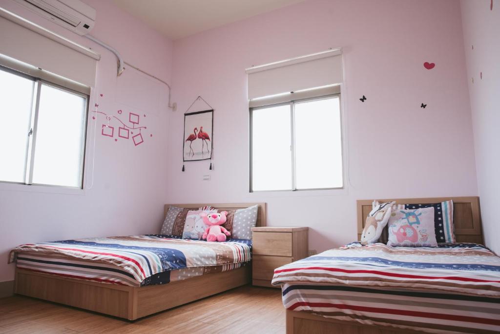 Postel nebo postele na pokoji v ubytování Dan Bao Homestay
