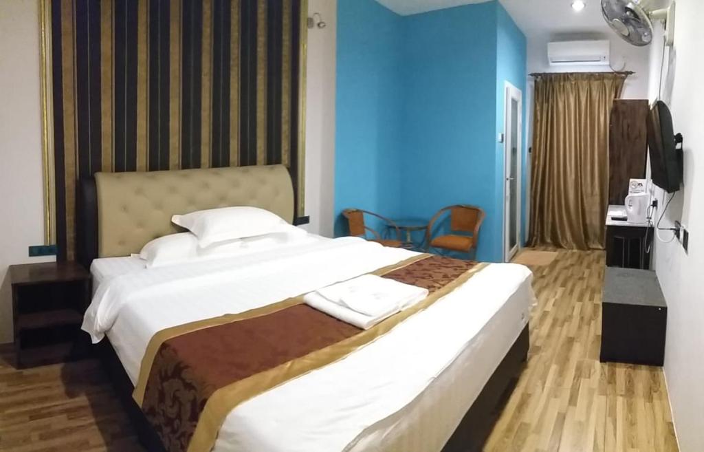 Postel nebo postele na pokoji v ubytování Pilly Homestay