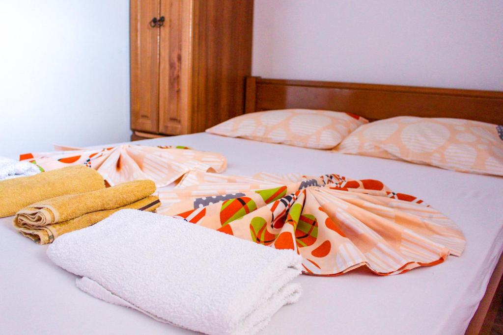 Postel nebo postele na pokoji v ubytování Friendly House