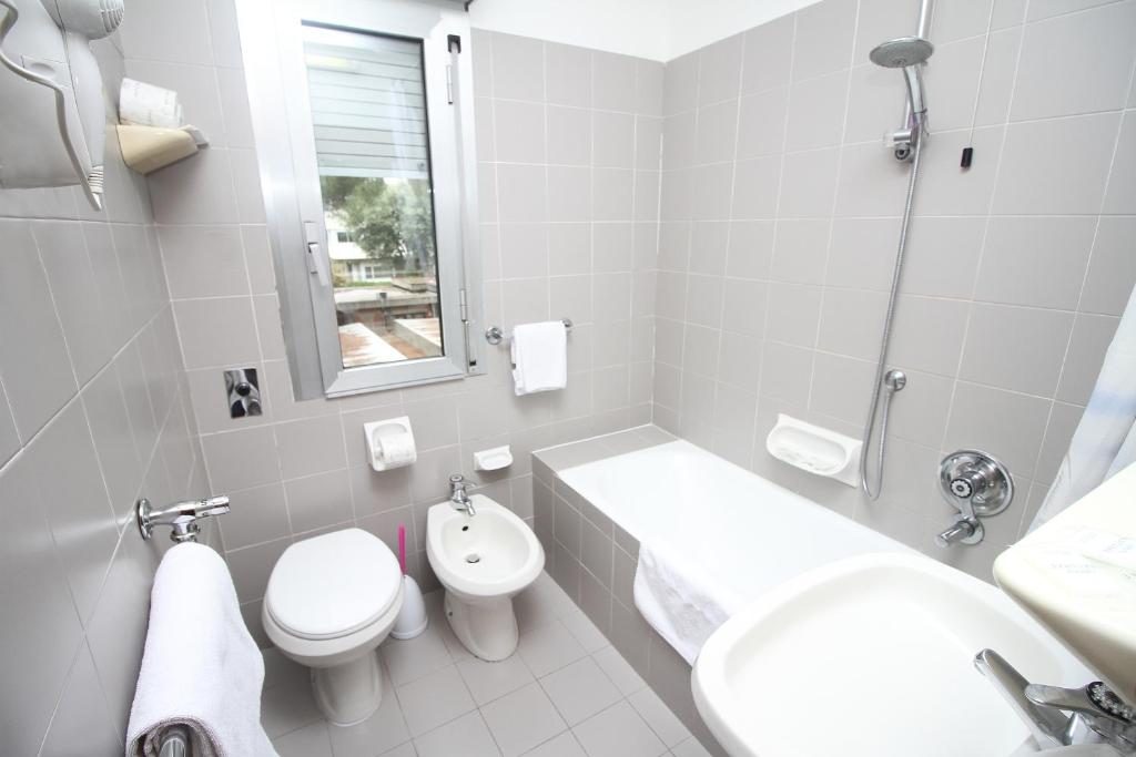 Koupelna v ubytování Hotel Corolle