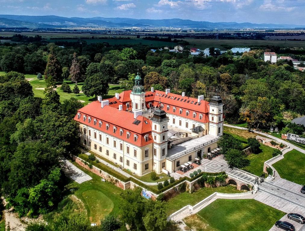 an aerial view of a large building with a red roof at Theresia Chateau - Bernolákovo in Bernolákovo