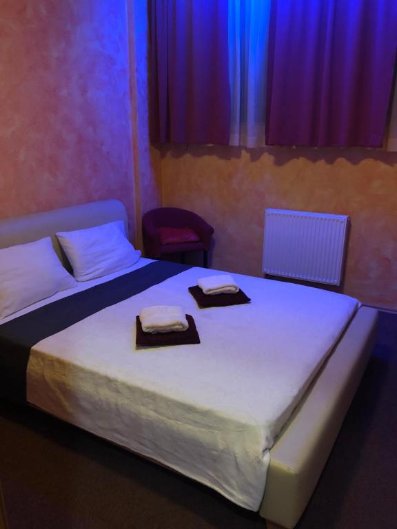 Postel nebo postele na pokoji v ubytování Motel Sofia