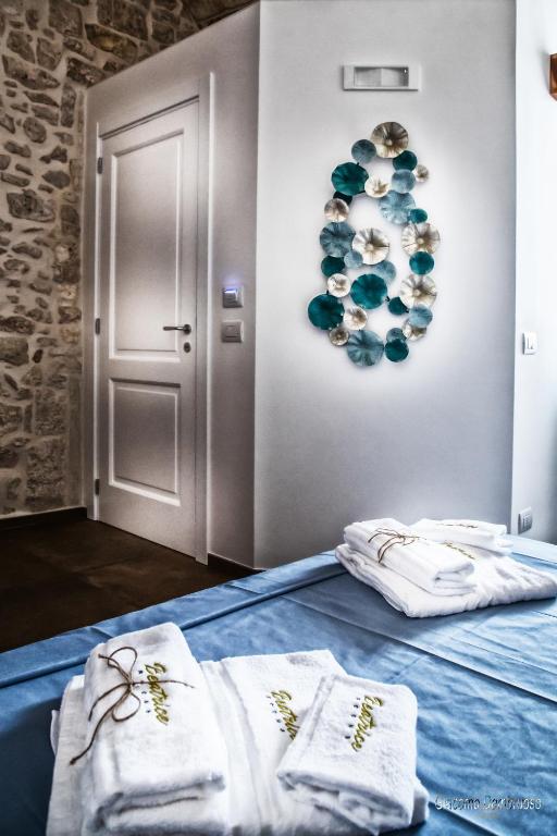 Postel nebo postele na pokoji v ubytování Beatrice rooms