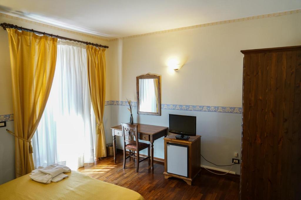 Telewizja i/lub zestaw kina domowego w obiekcie Stesicorea Palace