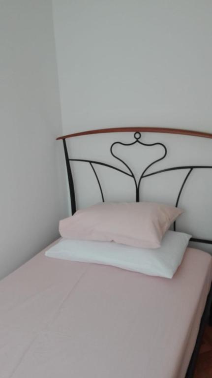 Postel nebo postele na pokoji v ubytování Rooms Marana
