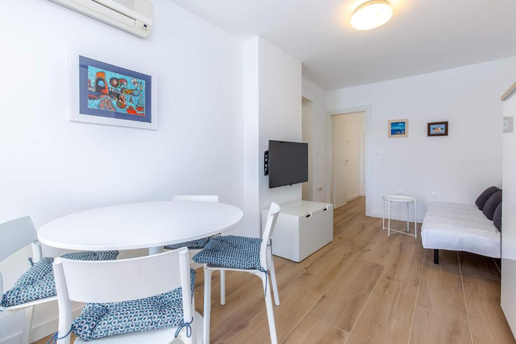 Postel nebo postele na pokoji v ubytování Apartments Selce