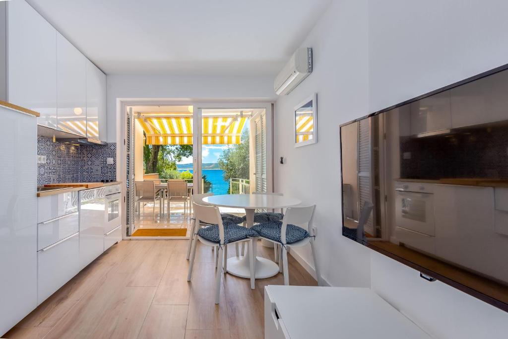 Kuchyň nebo kuchyňský kout v ubytování Apartments Selce