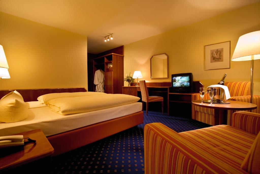 Voodi või voodid majutusasutuse Sieben Welten Hotel & Spa Resort toas