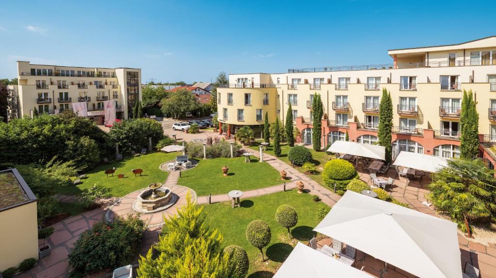 an aerial view of a park with buildings at Hotel Villa Toskana in Leimen