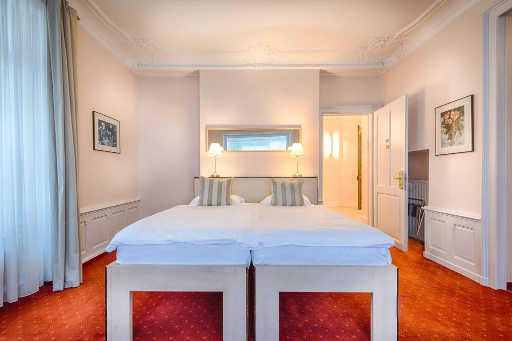 Letto o letti in una camera di Villa Toscane