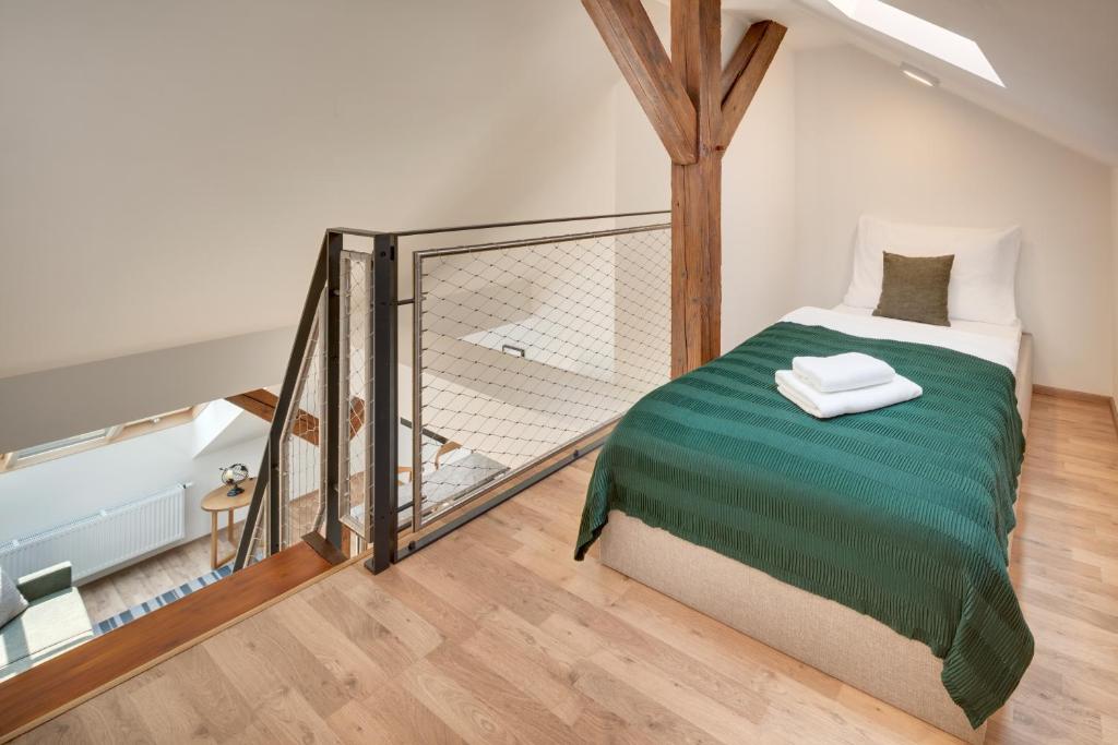 Postel nebo postele na pokoji v ubytování Louren Apartments