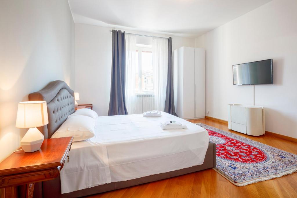 Posteľ alebo postele v izbe v ubytovaní HT Residence Maximus