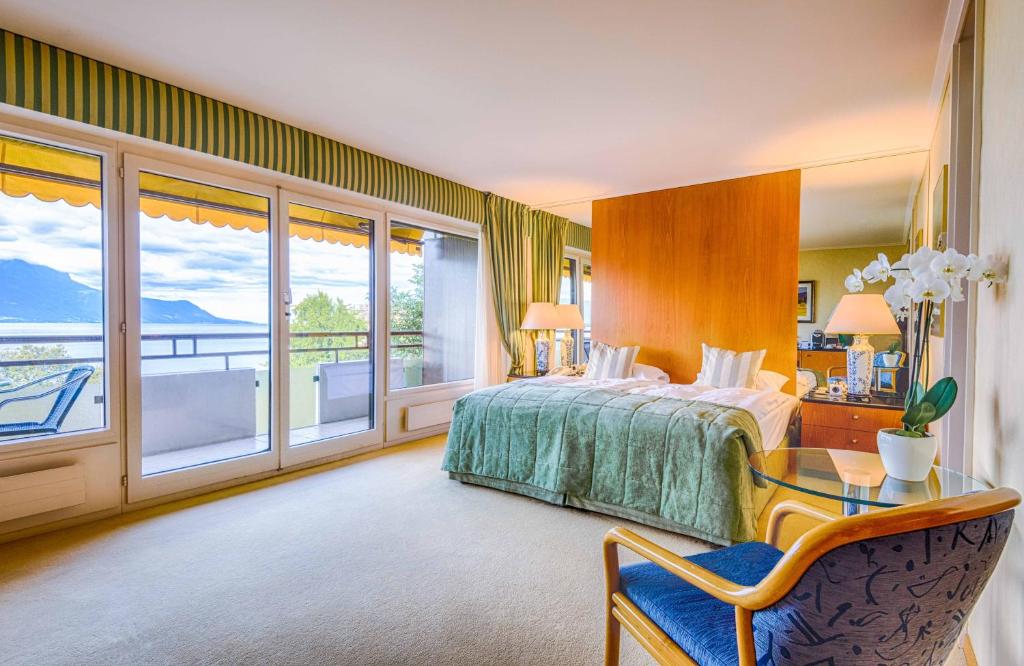 Postel nebo postele na pokoji v ubytování Royal Plaza Montreux