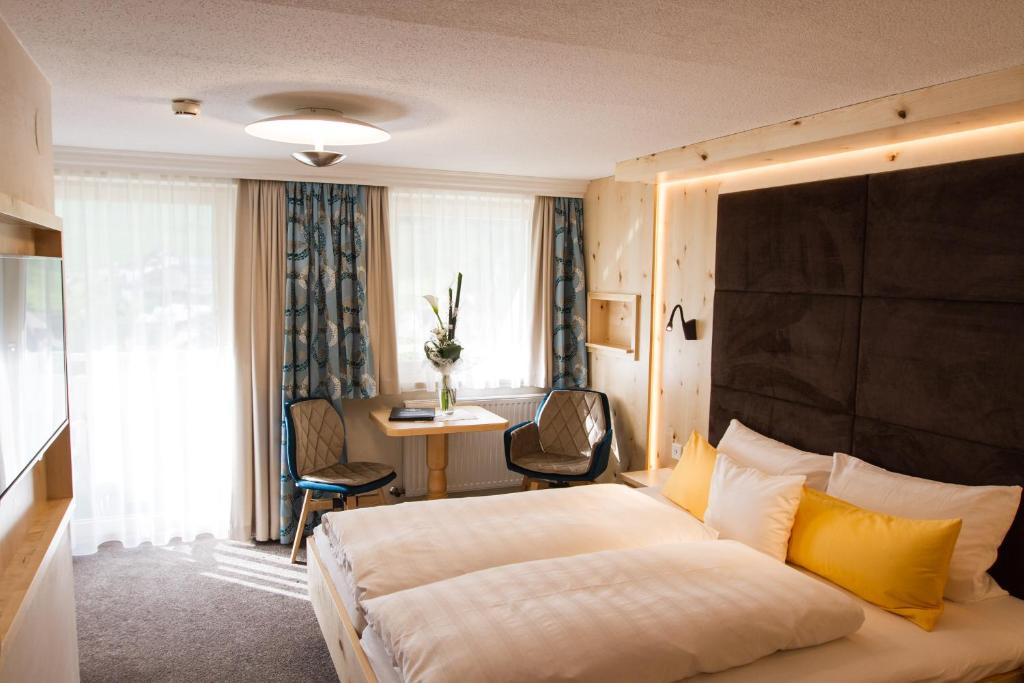 Ein Bett oder Betten in einem Zimmer der Unterkunft Hotel Jägerhof