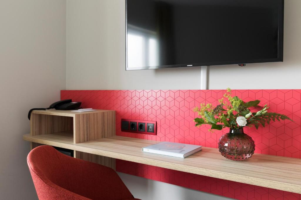 TV a/nebo společenská místnost v ubytování Good Morning+ Halmstad